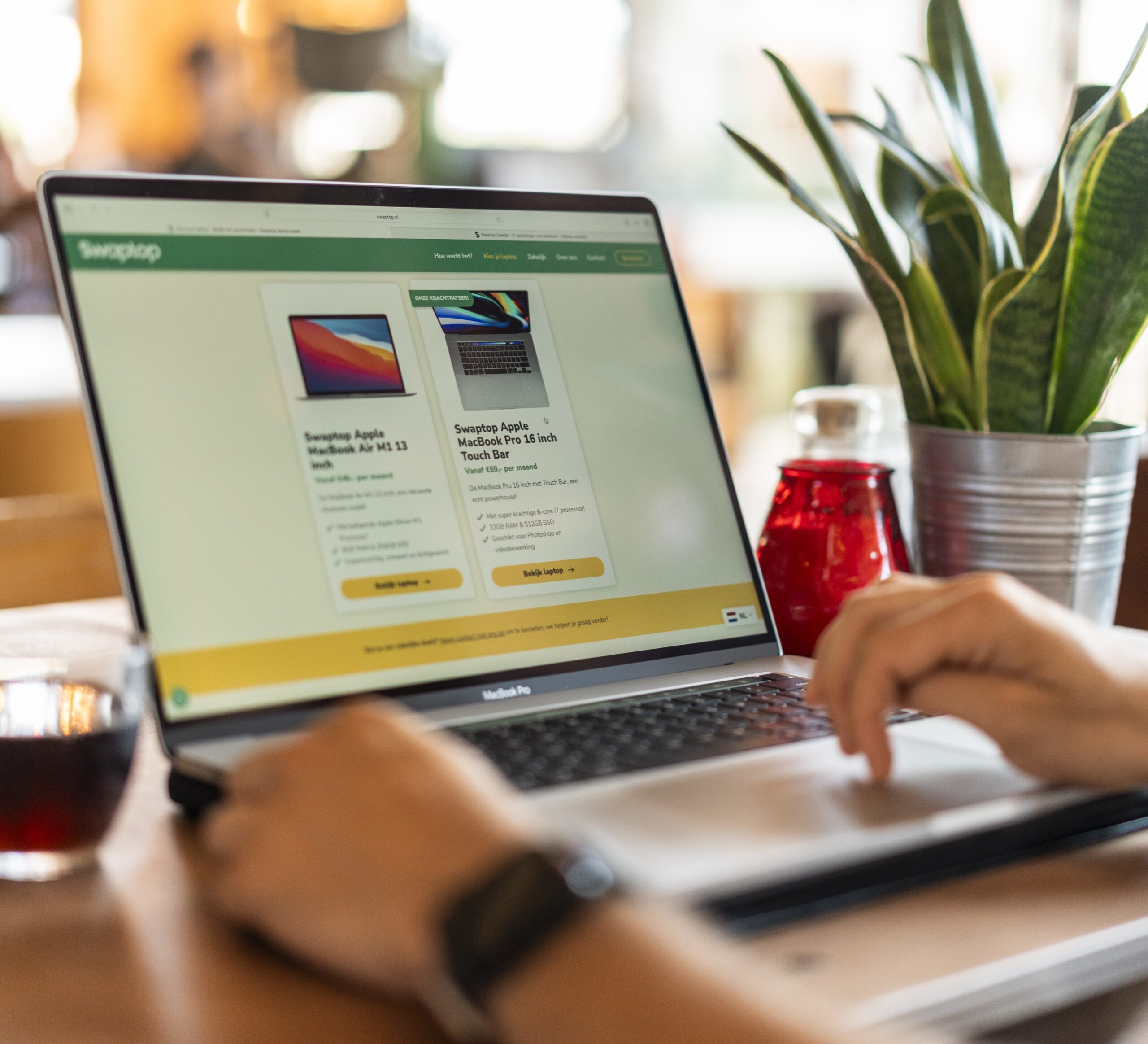 Apple-Macbook-Pro-16-Inch-Touchbar_Macbook-on-table-front-1